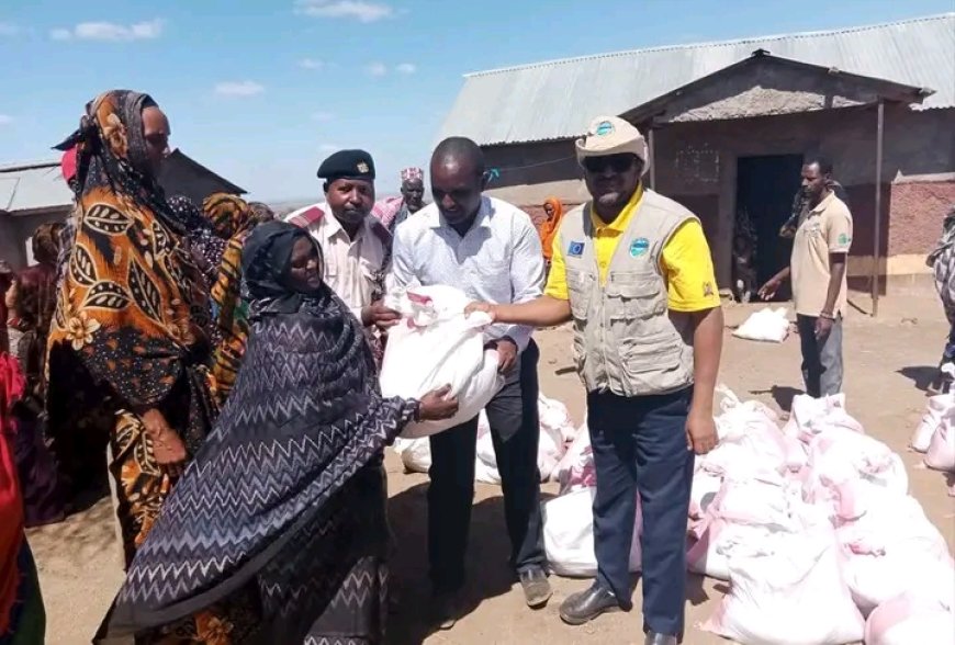 Hunger-stricken families receive food donations from the Rotary Club