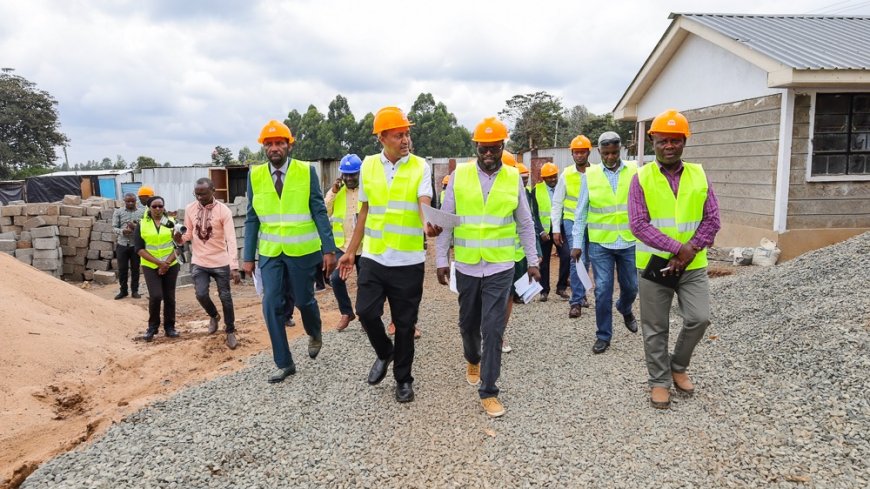 The committee inspects the construction works on the site.