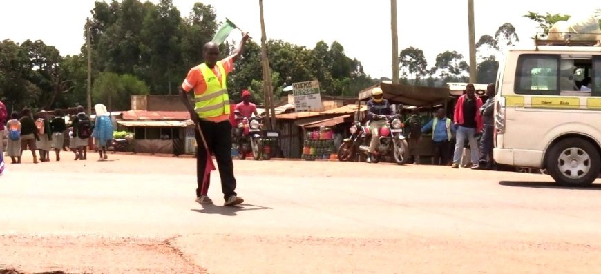 'Awilo’- Lugari flagman helping learners, pedestrians cross busy highway